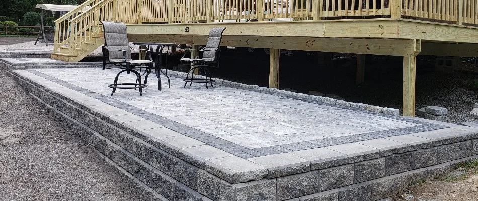 Paver patio in Groton, CT, with chairs.