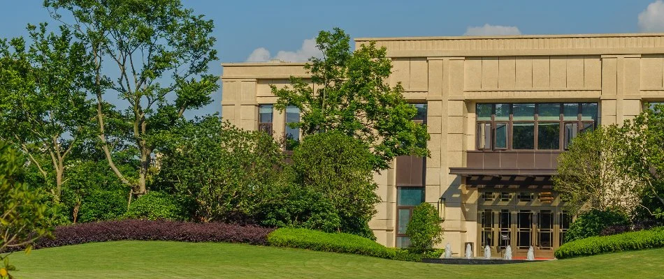 Trees and shrubs outside a building in Old Saybrook, CT.