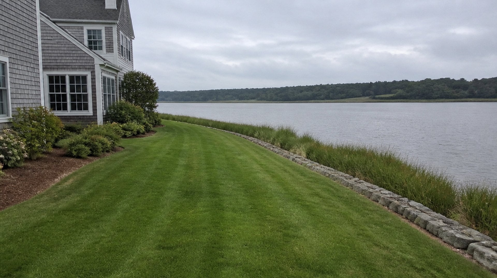 Waterfront lawn on the Mystic River, where a Mystic CT wetlands permit may apply