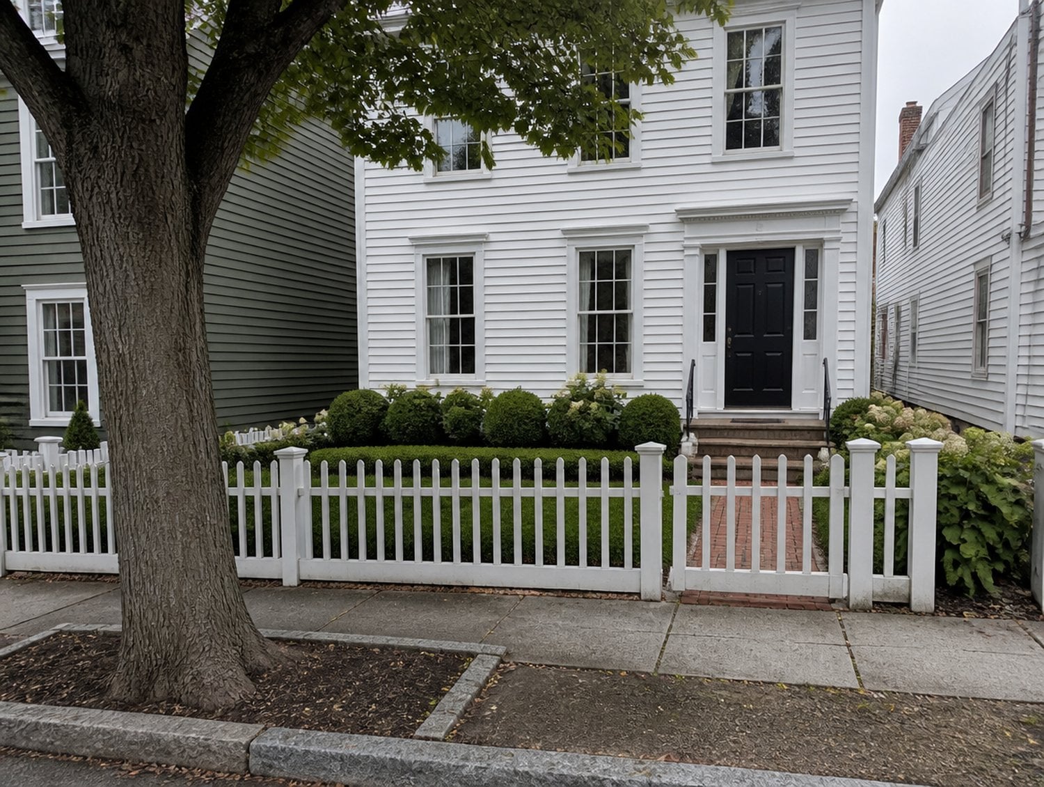 Historic district lot where snow removal in downtown Mystic has to be done by hand