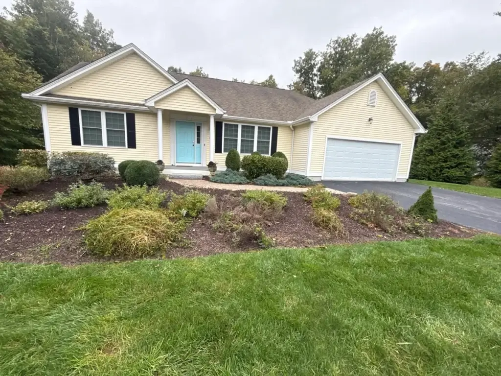 Front foundation beds after a landscape update at a Groton, CT ranch home